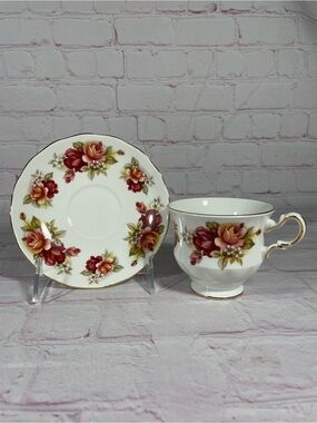 Vintage Queen Anne 8541 Red and Pink Rose Footed Teacup and Saucer Set Gold Trim